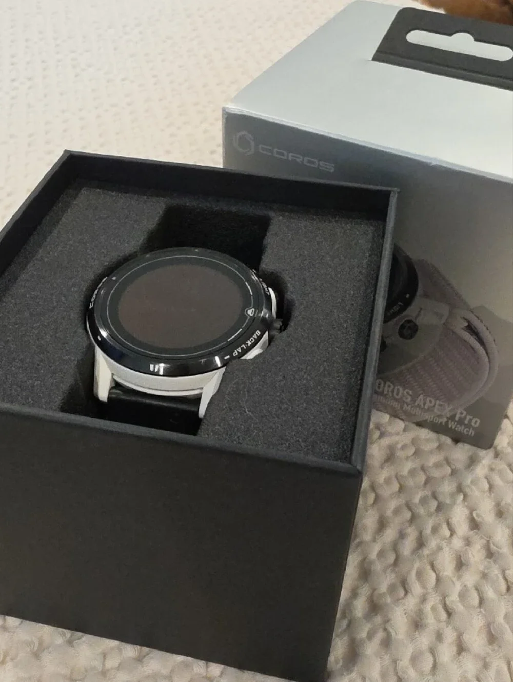 Coro APEX Pro Smartwatch in White with Black Band